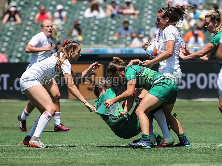 2018RugbySevensFri-16.JPG - Ashleigh Baxter of Ireland is tackled and yields the ball to  England in the women's first round of the 2018 Rugby World Cup Sevens, July 20-22, 2018, held at AT&T Park, San Francisco, CA. Ireland defeated England 19-14.